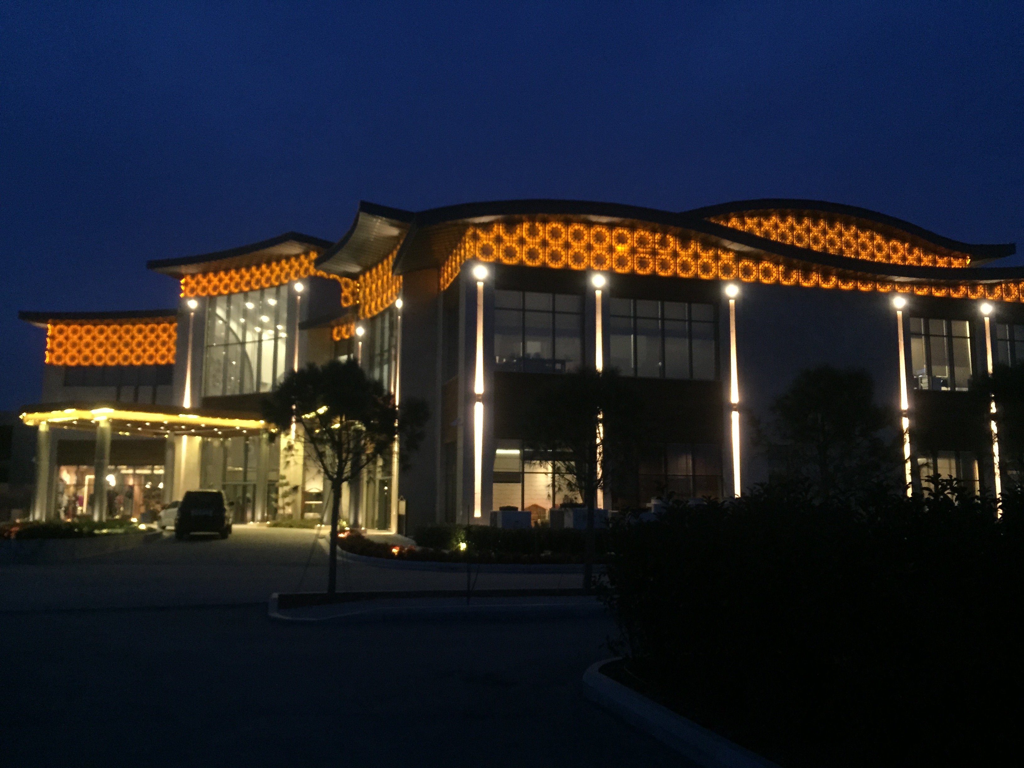Architectural and venue lighting installation with colour-changing fixtures